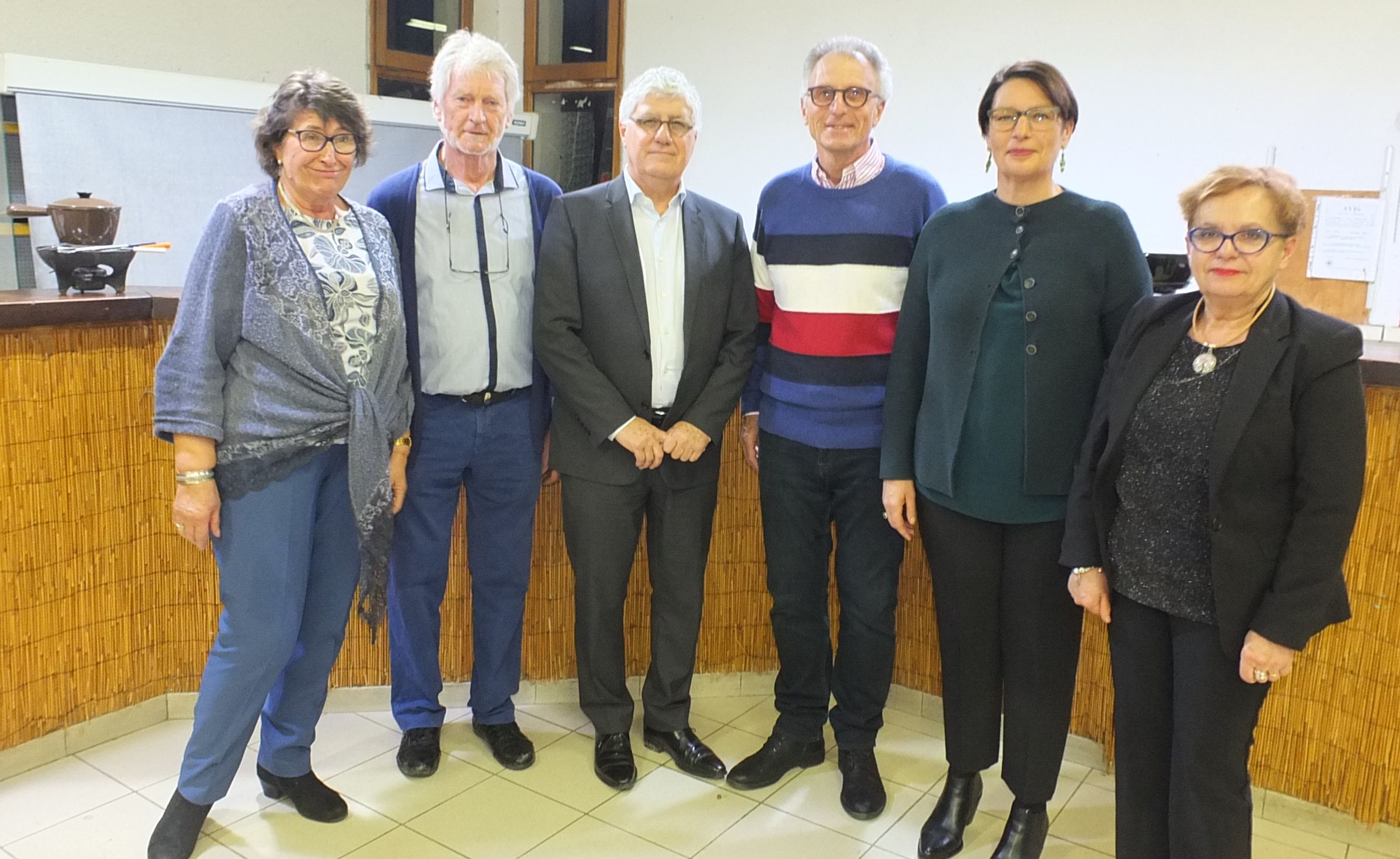 Le consul général de Suisse entre Philippe Martin et Sandrine Redolfi de Zan