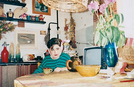 Bertien van Manen, Let's Sit Down Before We Go, Vlada in the kitchen, Kazan, 1992